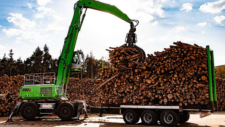 перегрузочный экскаватор SENNEBOGEN 830 E с прицепом
